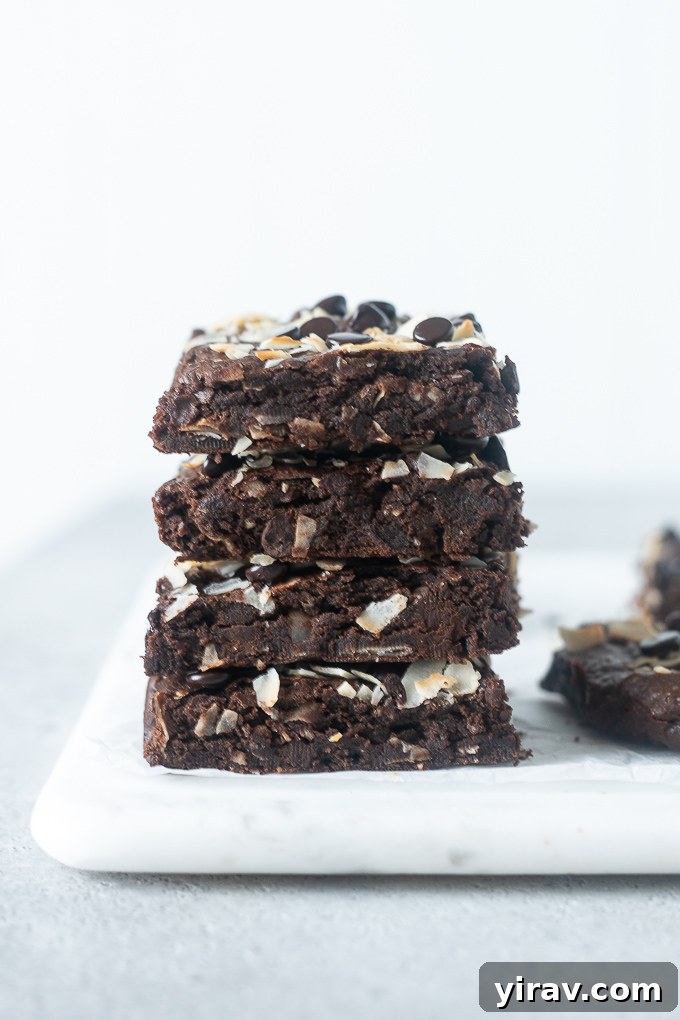 Stack of fudgy coconut brownies