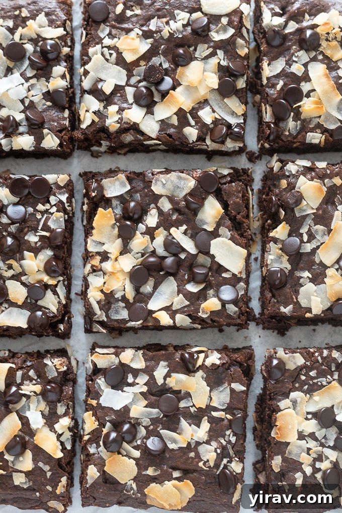 Dairy-free coconut brownies cut into squares on a cooling rack