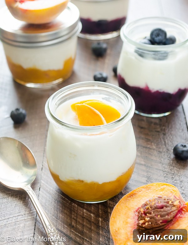 Homemade Fruit on the Bottom Yogurt Cups with layers of vibrant fruit compote, creamy plain yogurt, and crunchy granola, perfect for a healthy breakfast or snack.