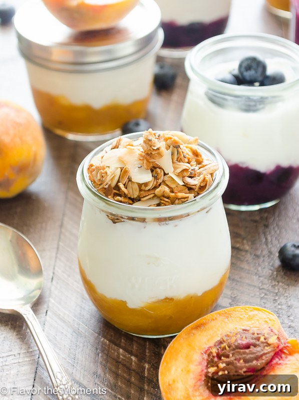 A jar of Fruit on the Bottom Yogurt, generously topped with a golden granola, ready to be enjoyed as a wholesome and satisfying meal.