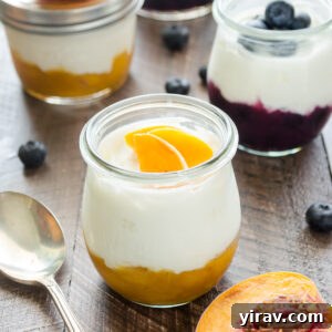 Homemade fruit on the bottom yogurt cups in jars.