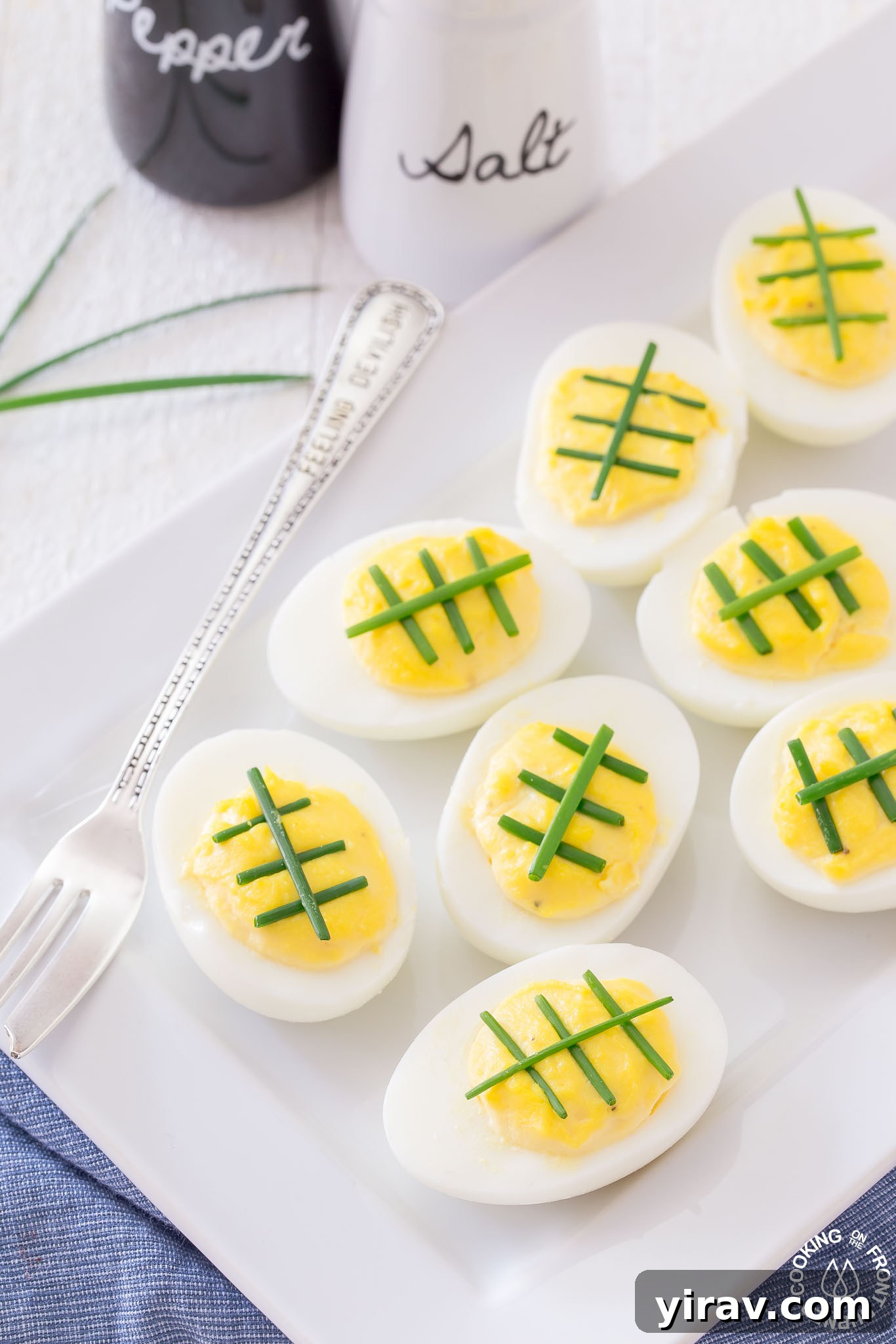 31 Tailgating Snacks That Steal the Show 24 Festive football-themed deviled eggs, creatively garnished for game day.