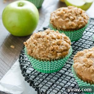 Apple oatmeal muffins with apple behind