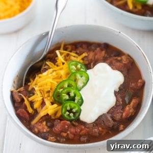 A close-up of Slow Cooker Turkey Chili in a bowl, ready to be served.
