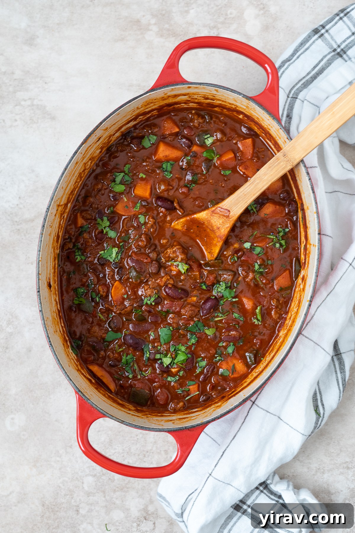 Chorizo chili with sweet potato in a Dutch oven.