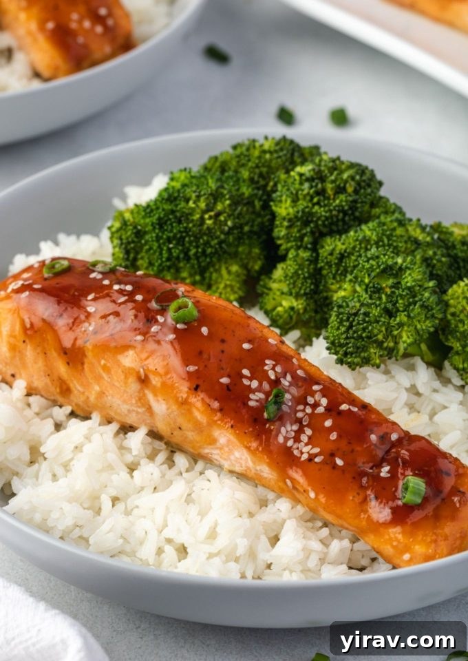 Glazed Teriyaki Salmon 2 Tender Baked Teriyaki Salmon served over a bed of fluffy rice