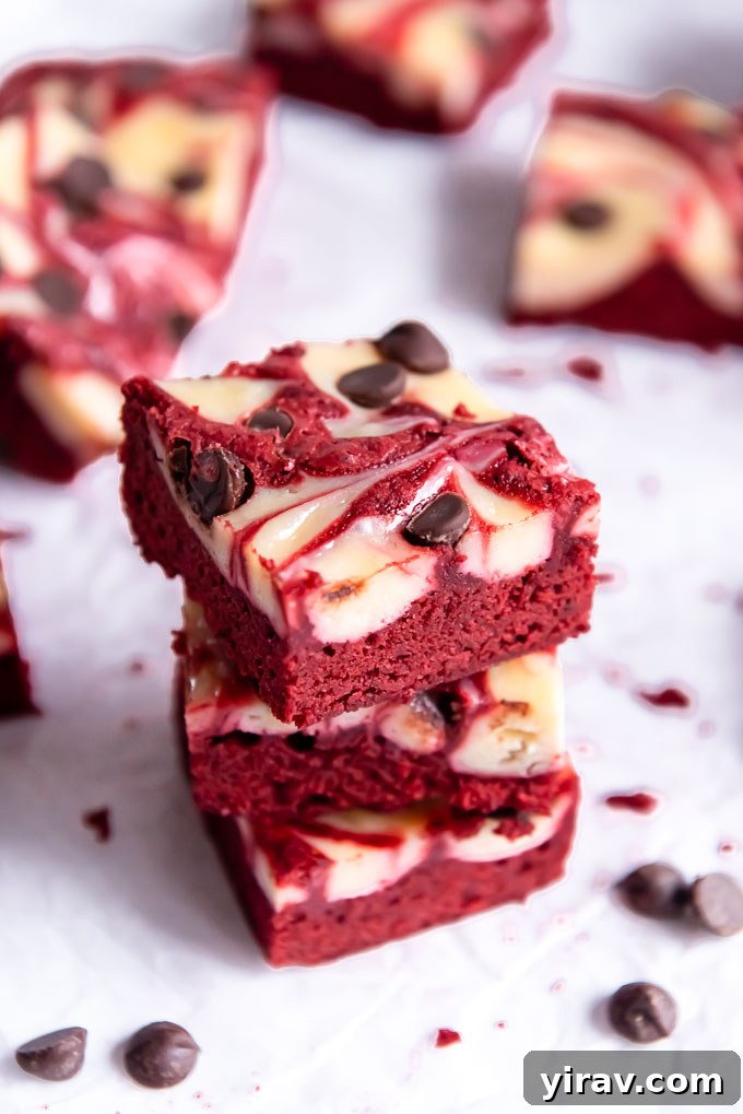 Velvet Dream Brownies 6 An inviting stack of rich Red Velvet Brownies, perfectly cut and ready to be enjoyed.