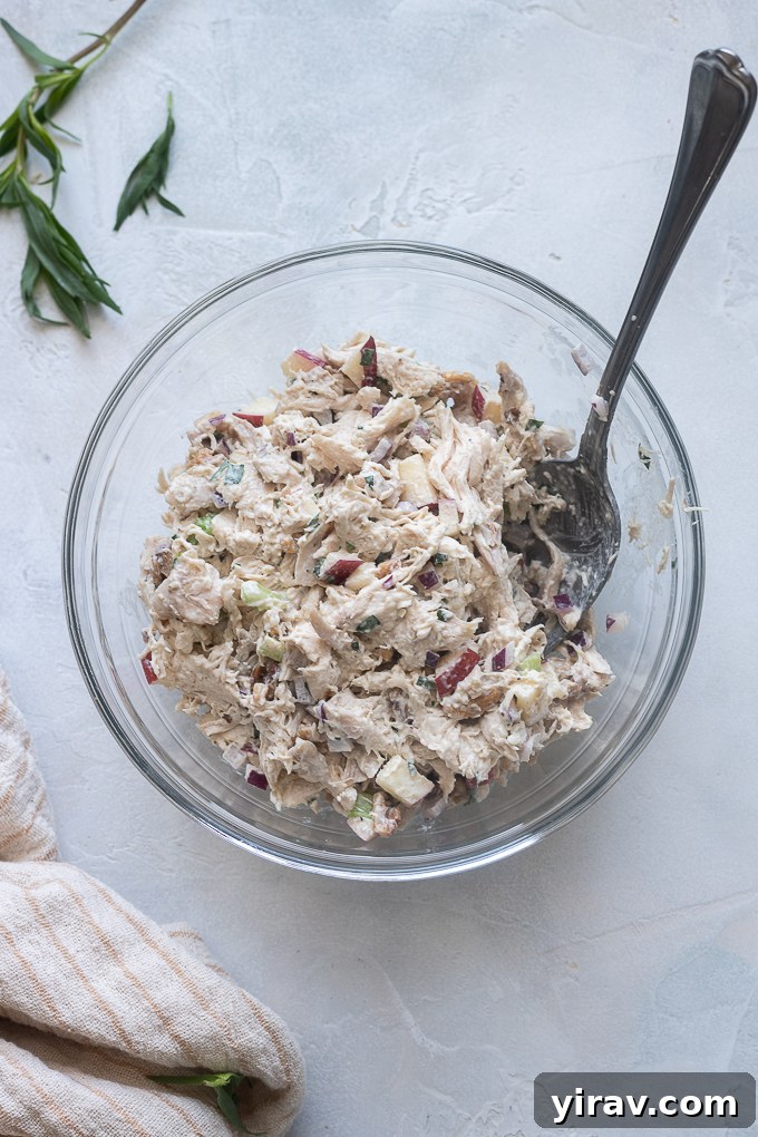 Assembled tarragon chicken salad in mixing bowl.