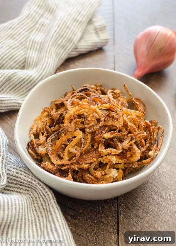Close-up of crispy fried shallots, golden brown and crunchy