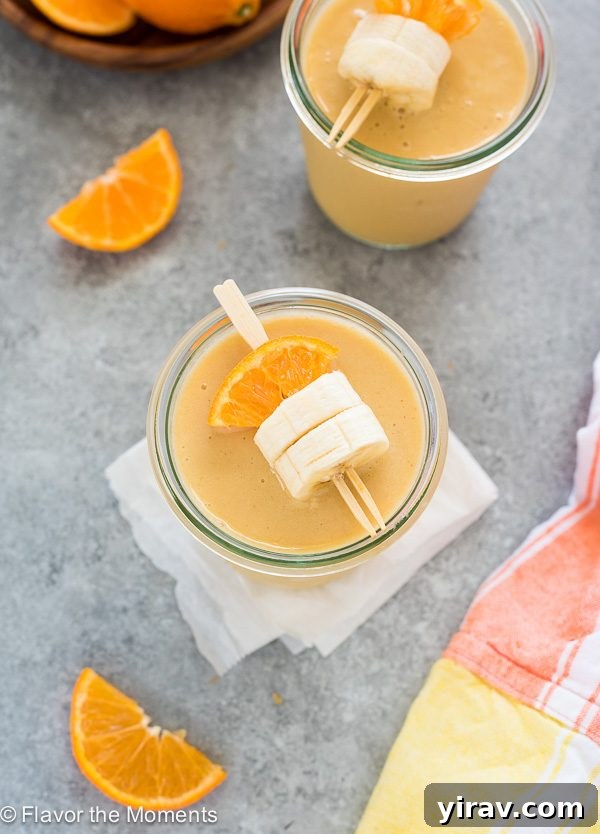 Citrus Cream Dream 3 Overhead view of a beautifully presented orange creamsicle smoothie in a jar