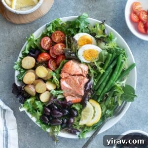 Vibrant Salmon Nicoise 8 Salmon nicoise salad with ingredients surrounding