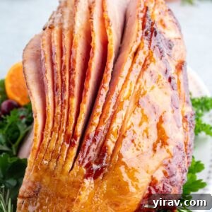 Slow cooker ham with maple glaze on a serving platter