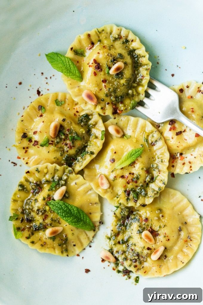Homemade Vegan Ravioli with a vibrant fava bean filling, showcasing a plant-based pasta dish.