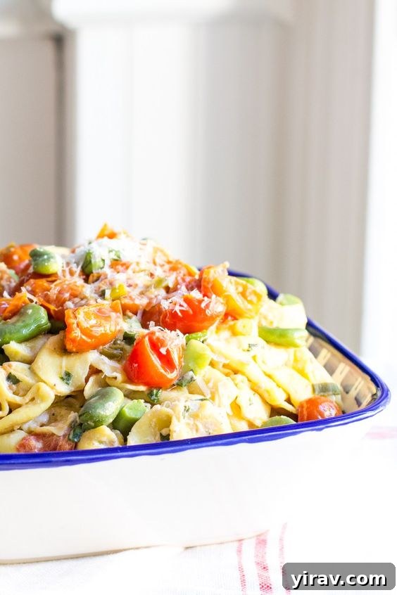 Cheese Tortellini with Herbed Ricotta and Fava Beans, presented in a large serving dish.
