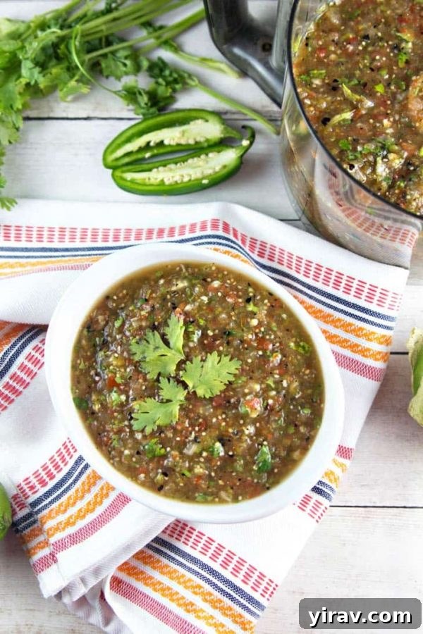 Roasted tomatillo salsa verde in a white bowl