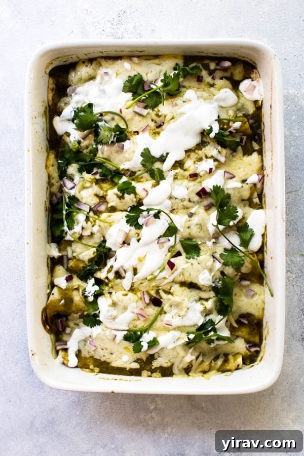 Salsa verde chicken enchiladas in baking dish