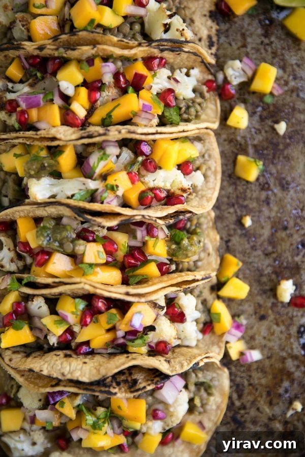 Overhead view of lentil tacos on baking sheet