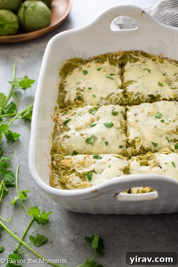 chicken enchilada bake cut into squares in baking dish