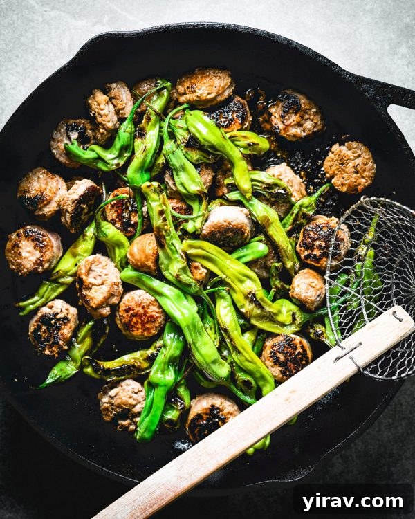 Skillet of shishito peppers and sausage