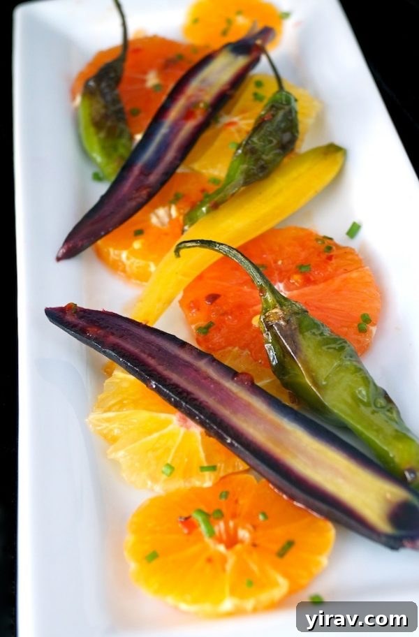 Citrus carrot salad on white plate