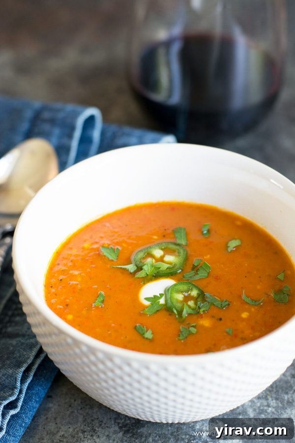 Shishito pepper bisque in a white bowl