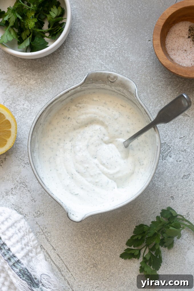 Ranch dressing using Greek yogurt in a bowl.