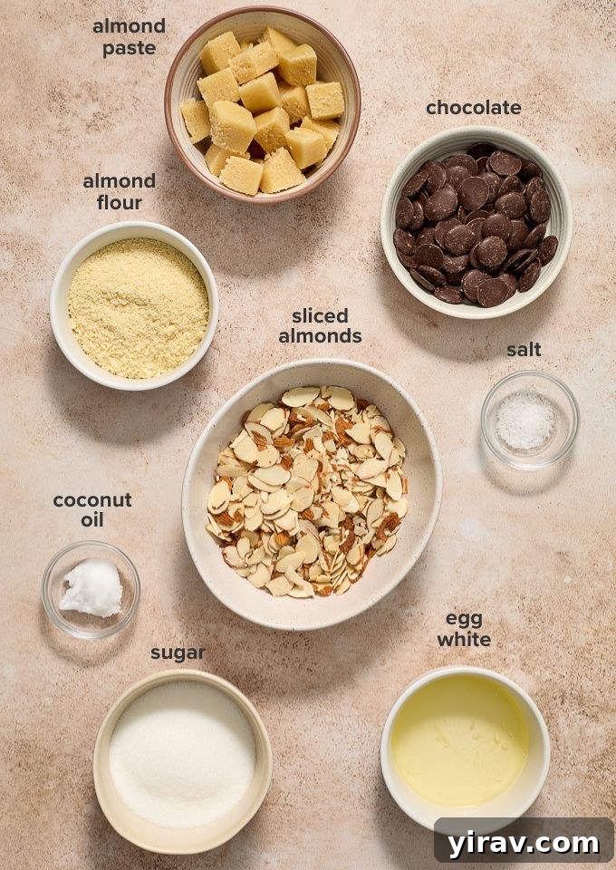 A flat lay photograph showcasing all the ingredients required for almond horn cookies.