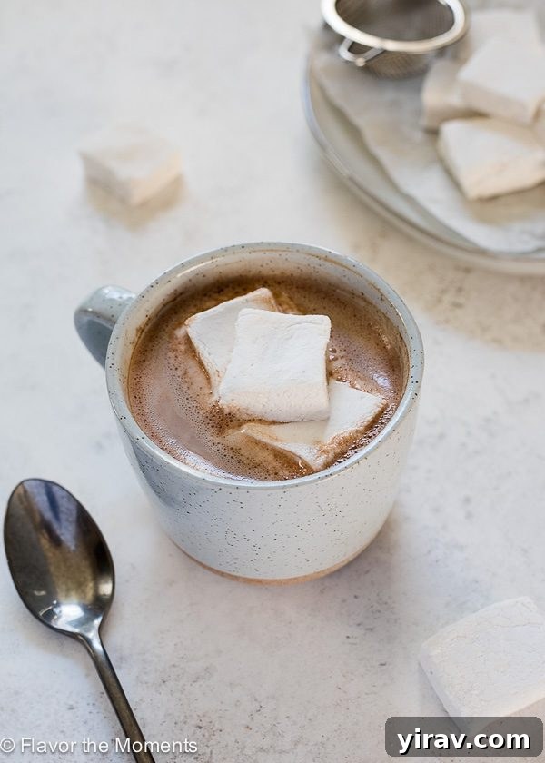Microwave hot chocolate in a mug with marshmallows in a mug