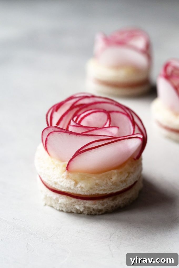 A radish rose tea sandwich, elegantly prepared for a special occasion.