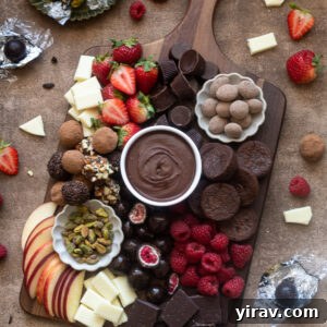 Chocolate charcuterie board with chocolate ganache, fruits and more.