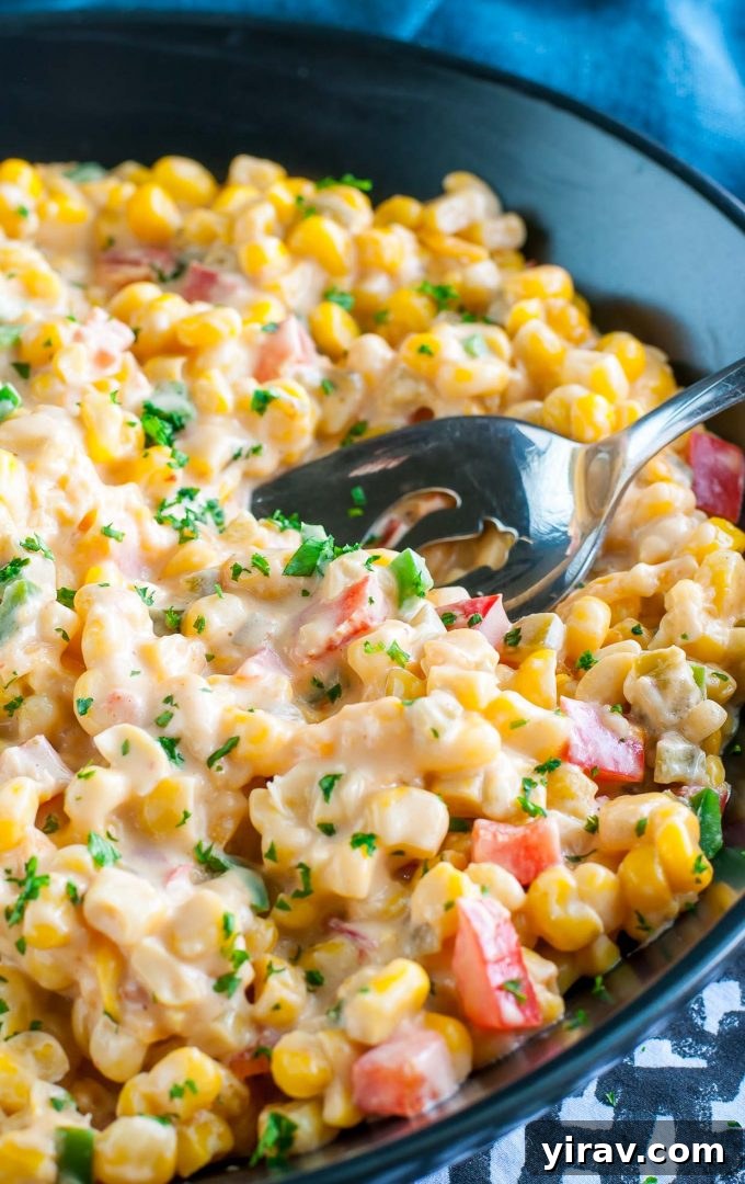 A rustic dish of Spicy Southern Hot Corn, showing creamy texture and vibrant kernels.