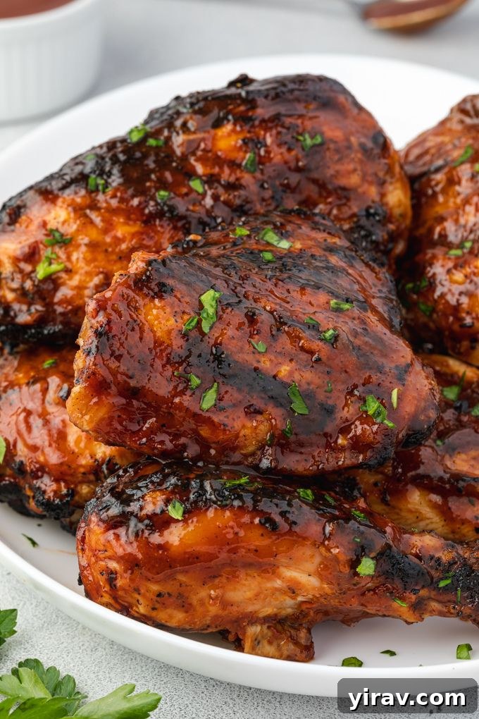 Platter of barbecued chicken garnished with parsley