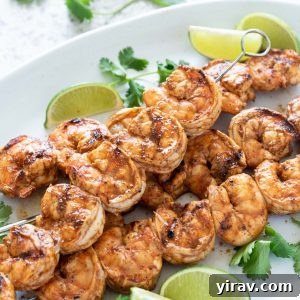 Chili lime grilled shrimp skewers on a serving platter