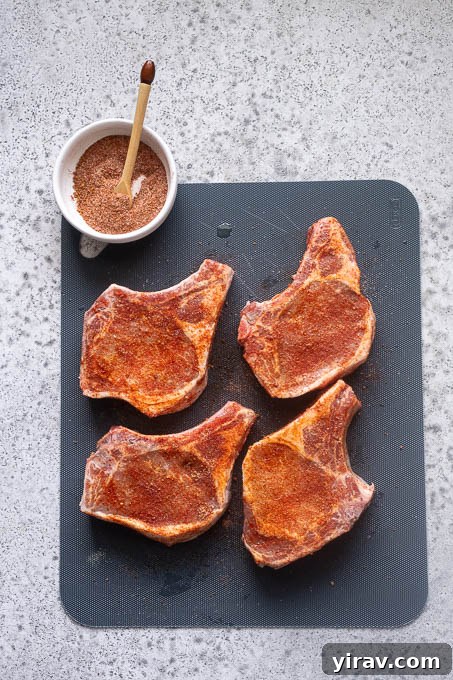 Tender Oven Baked Pork Chops 6 Season the pork chops with the sweet and smoky rub.