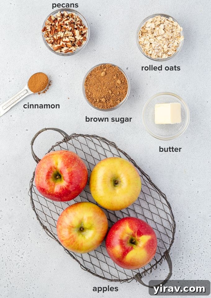 Baked Apple Bliss 4 A collection of fresh baking apples and the streusel ingredients laid out on a kitchen counter, ready for preparation.