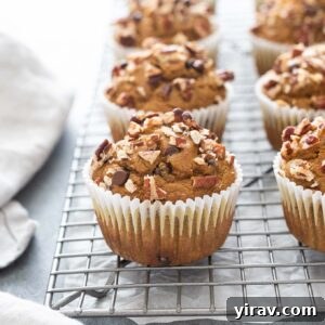 Healthy pumpkin muffins on a wire rack