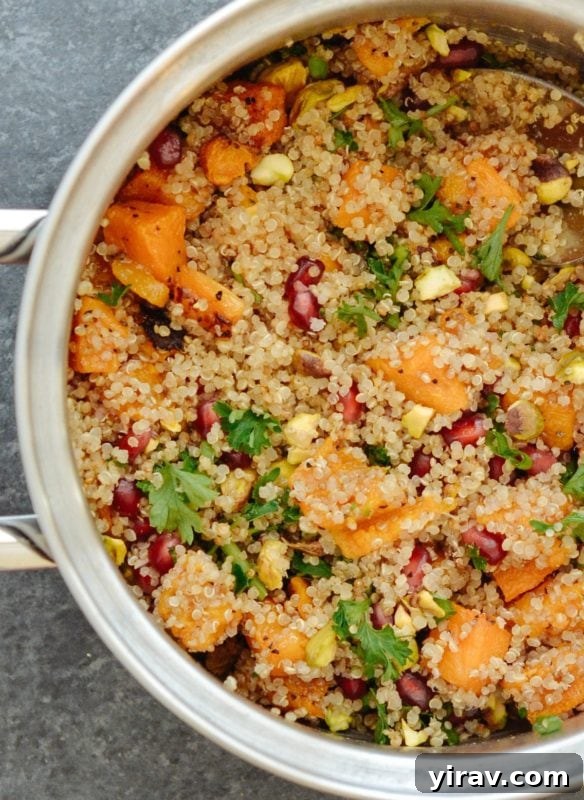 Overhead view of a pot of kabocha squash quinoa salad.