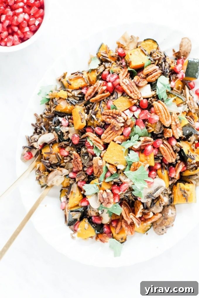 Overhead view of a platter of wild rice salad with kabocha squash.