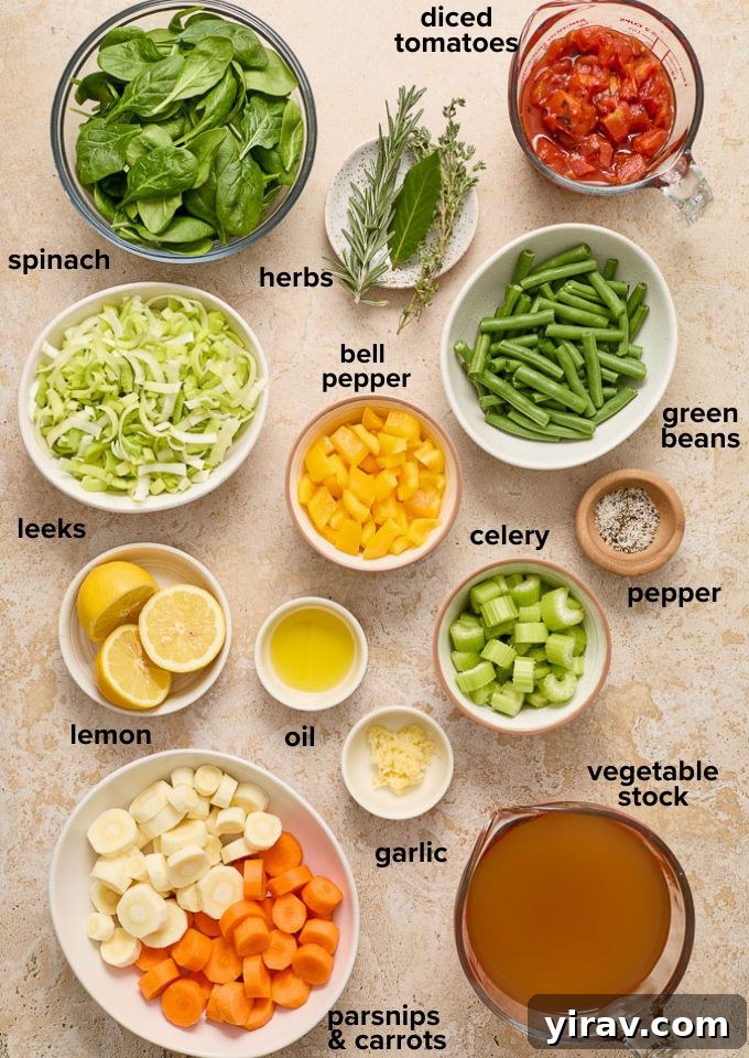 Various fresh ingredients for Instant Pot Vegetable Soup, including leeks, carrots, parsnips, and bell peppers.