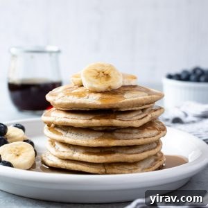 Stack of oat flour pancakes on a plate