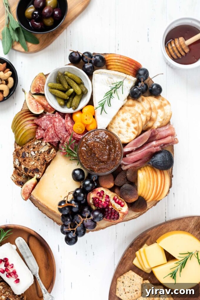 Fall charcuterie board adorned with a rich array of seasonal ingredients, including cheeses, meats, fresh fruits, nuts, and aromatic herbs.