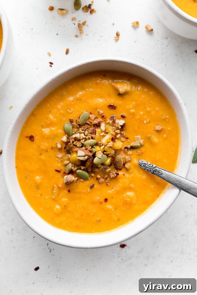 Roasted red pepper soup with seeds on top