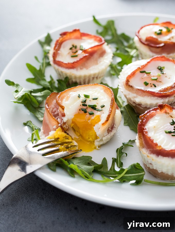 Close-up of freshly baked bacon and egg cups, golden and inviting, ready to be enjoyed.