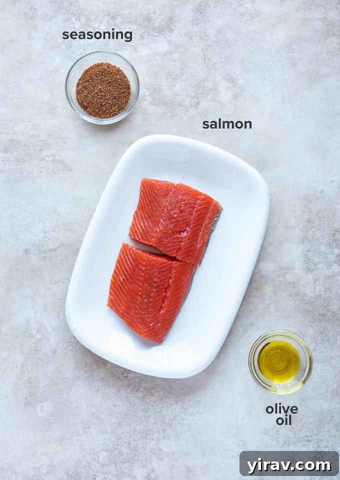 Effortless Air-Fried Salmon 4 Ingredients for making air fryer salmon: salmon fillets, olive oil, and seasoning