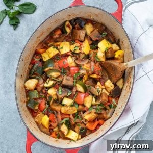 Effortless Ratatouille 15 Ratatouille in a Dutch oven with basil on top