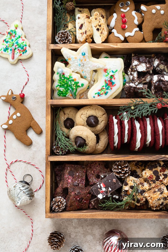 A charming cookie gift box featuring peanut blossom cookies, fudgy brownies, and other festive treats, perfect for holiday sharing