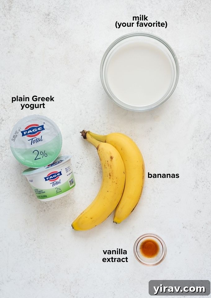 Quick Banana Bliss Smoothie 4 Four ingredients laid out on a wooden board: bananas, a carton of milk, a tub of Greek yogurt, and a bottle of vanilla extract.