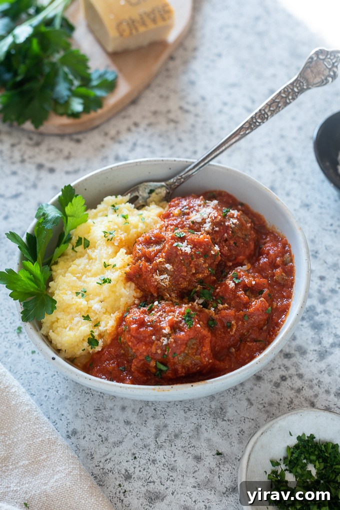 Instant pot polenta topped with meatballs
