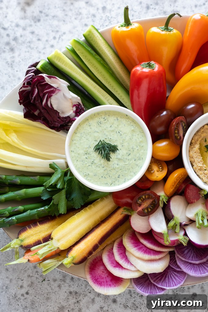 Green goddess dressing and vegetables on a crudités platter