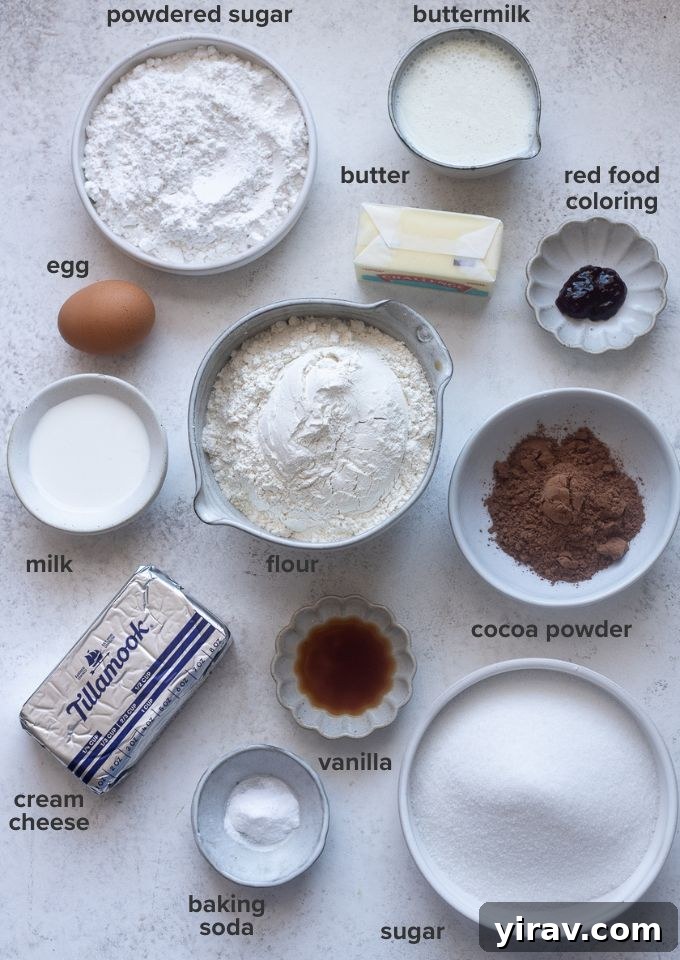 Ingredients for making red velvet whoopie pies laid out on a surface.